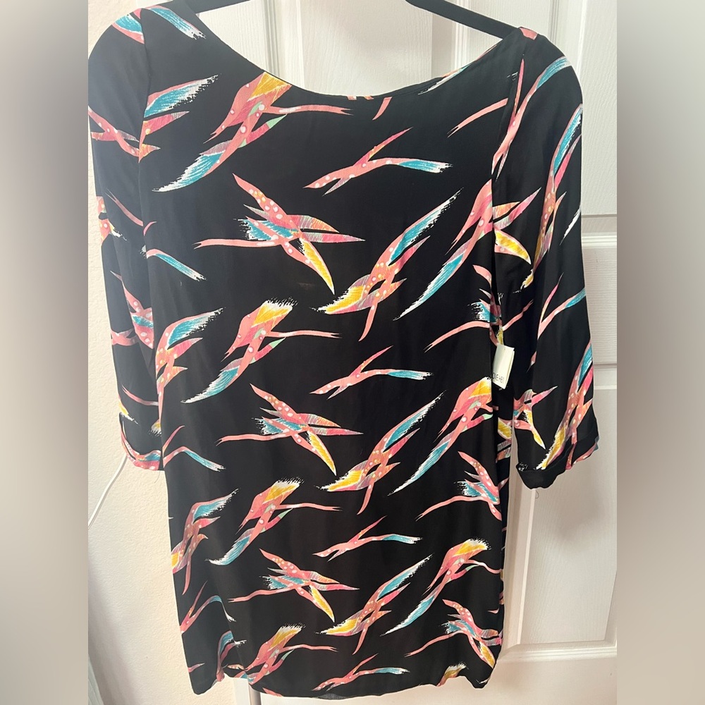 Brand NEW printed long sleeve black dress.